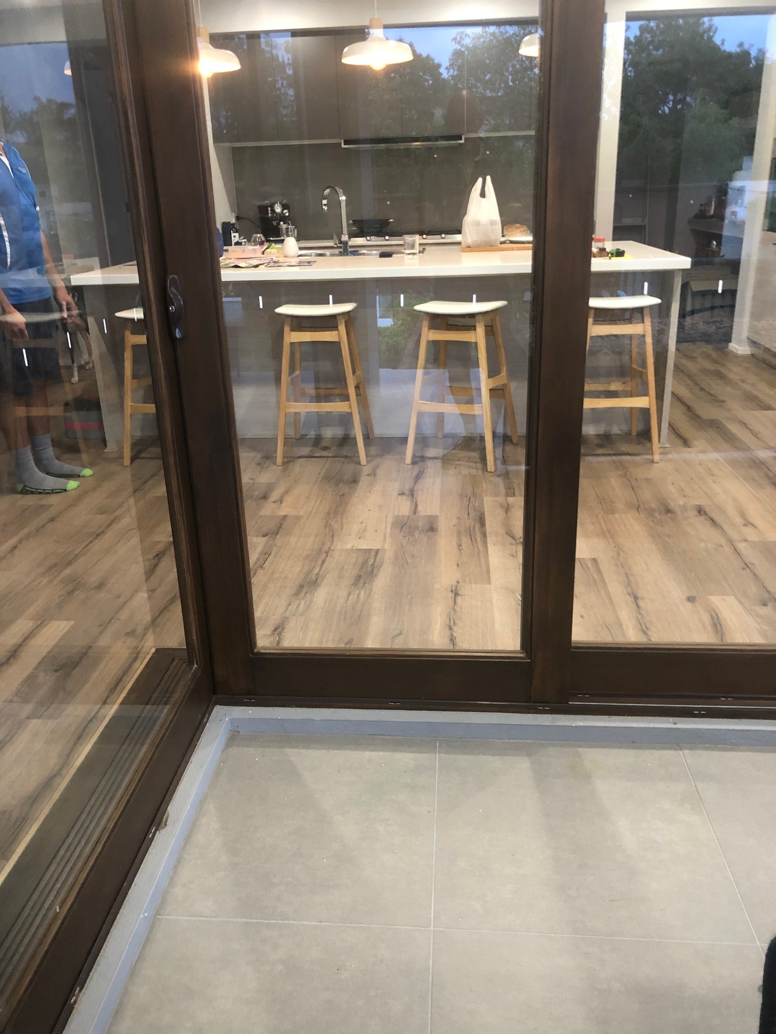 Timber stacking door sill and track detail after hardware repair